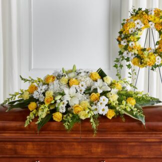 S5493: Golden Harmony Casket Spray
