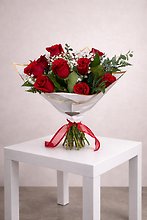 Wrapped: 12 Red roses w/ Babies Breath- for your own vase